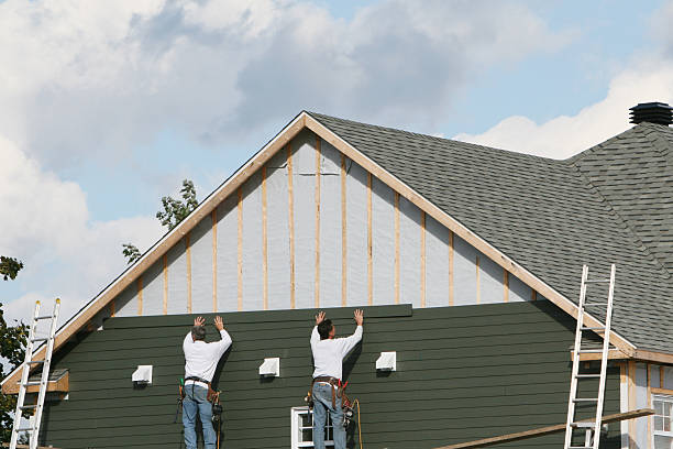 Professional Emergency Siding Repair technician working in Lorain, OH
